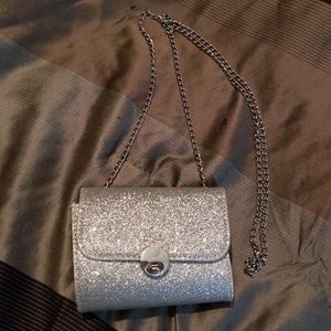small silver glittery evening purse